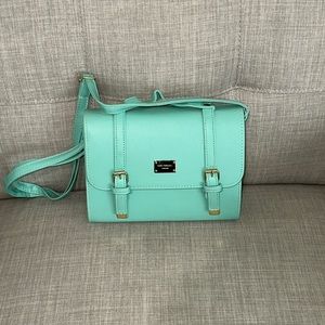 Turquoise small square bag never used